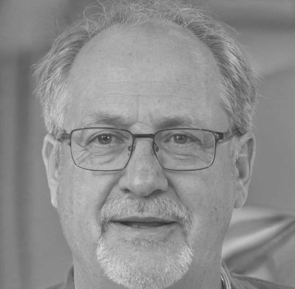 Professional headshot of senior systems engineer