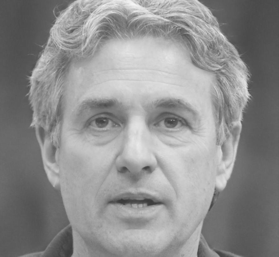 Professional headshot of hardware optimization consultant