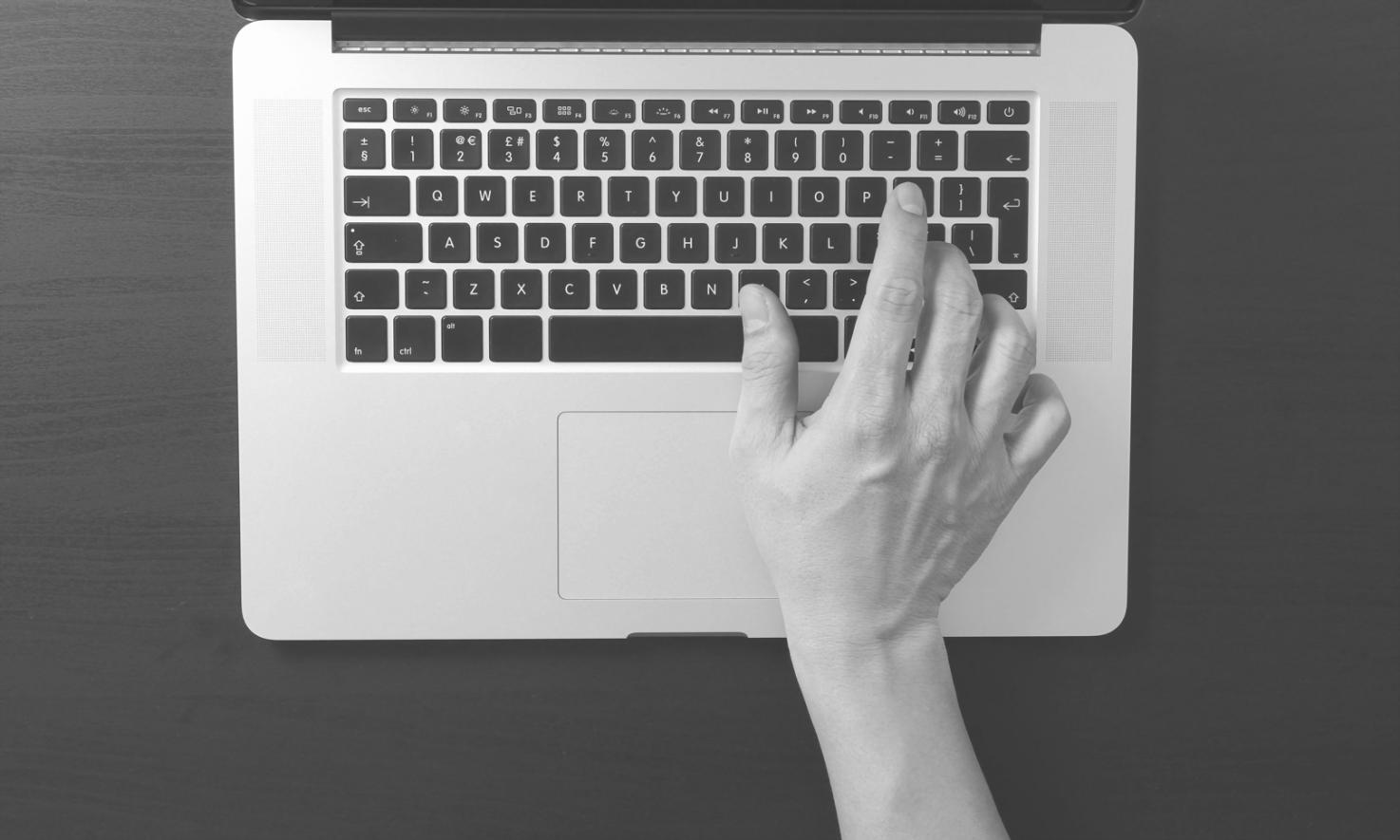 Healthcare professional using optimized medical computer systems for patient care